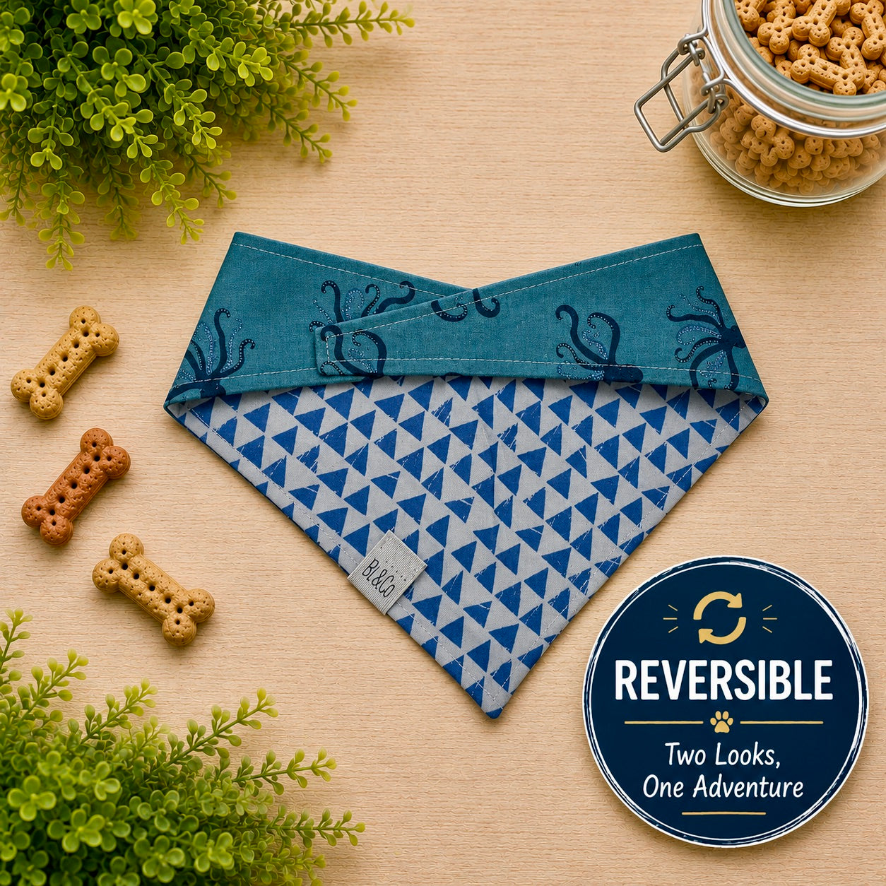 Blue reversible pet bandana with octopus pattern 