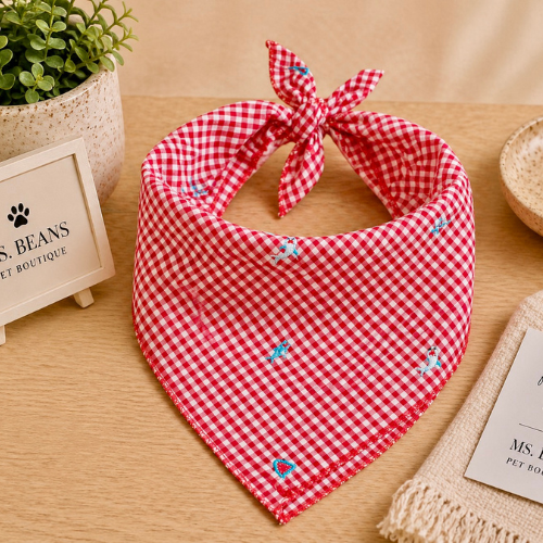 Red and white checkered bandana with small blue sharks on.